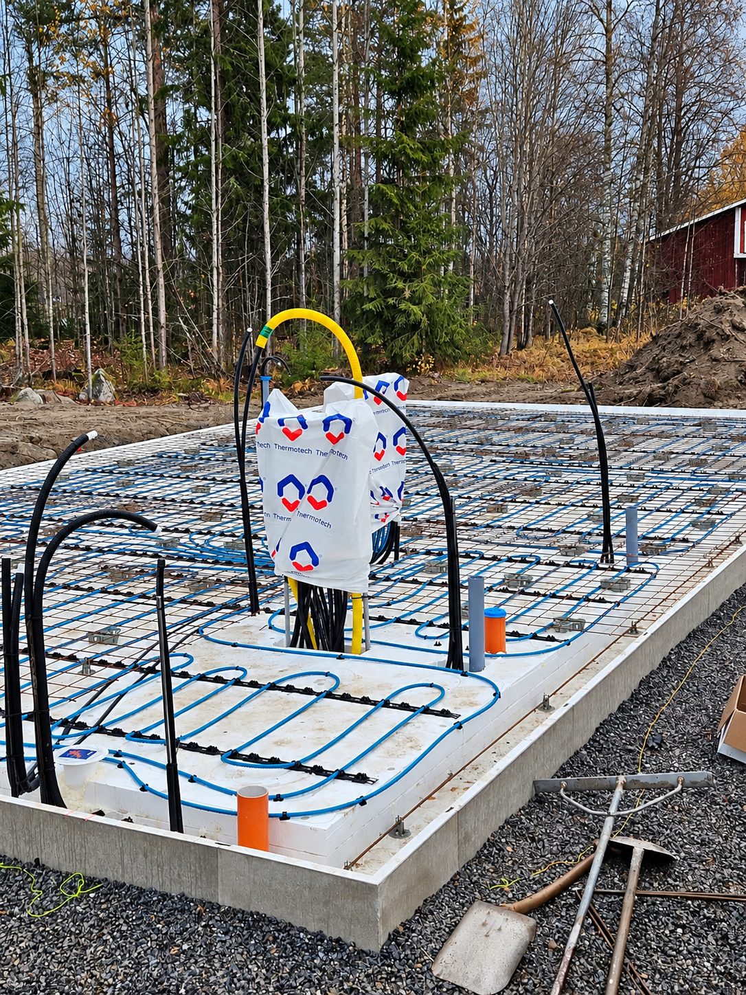 Platta på mark med golvvärme inför nybygge